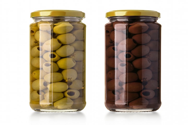 two olives bottles on a white background in bottle with clipping path